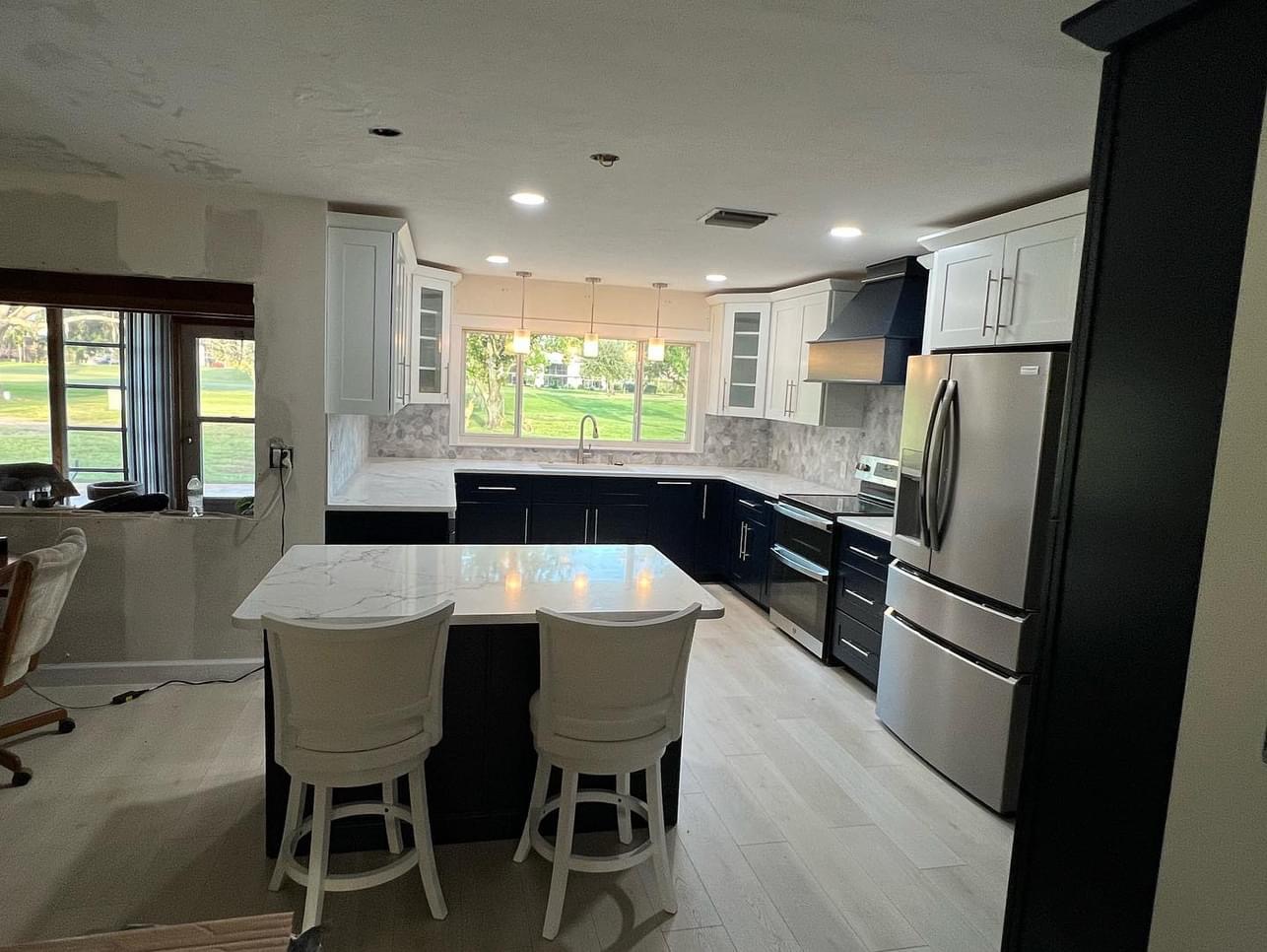 Wide view of two-tone cabinet installation